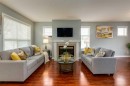 126 Harvest Gold Place Ne, Calgary, AB  - Indoor Photo Showing Living Room With Fireplace 