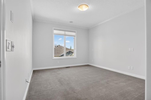 14 Discovery Woods Villas Sw, Calgary, AB - Indoor Photo Showing Other Room