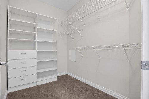14 Discovery Woods Villas Sw, Calgary, AB - Indoor With Storage