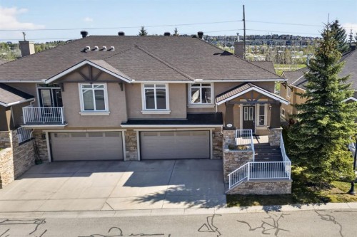 14 Discovery Woods Villas Sw, Calgary, AB - Outdoor With Deck Patio Veranda With Facade