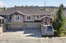 14 Discovery Woods Villas Sw, Calgary, AB  - Outdoor With Deck Patio Veranda With Facade 