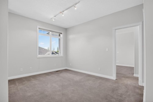 14 Discovery Woods Villas Sw, Calgary, AB - Indoor Photo Showing Other Room