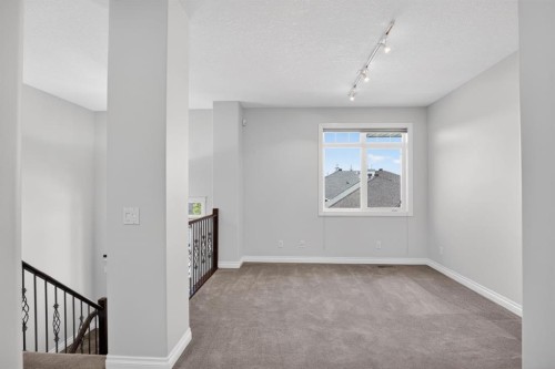14 Discovery Woods Villas Sw, Calgary, AB - Indoor Photo Showing Other Room
