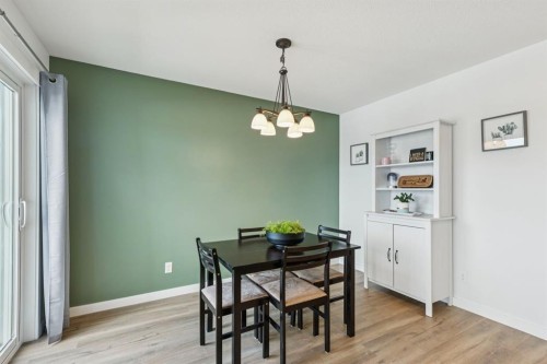 231 Kingsbridge Road Se, Airdrie, AB - Indoor Photo Showing Dining Room