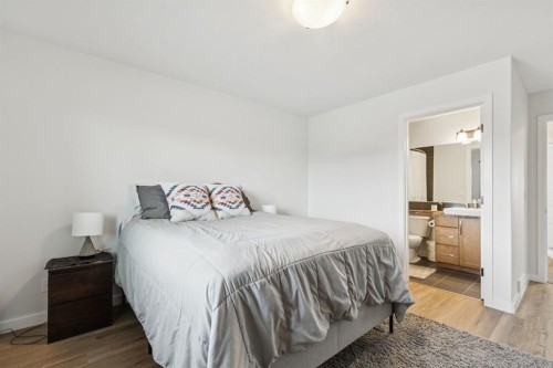 231 Kingsbridge Road Se, Airdrie, AB - Indoor Photo Showing Bedroom