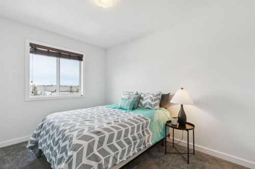 231 Kingsbridge Road Se, Airdrie, AB - Indoor Photo Showing Bedroom