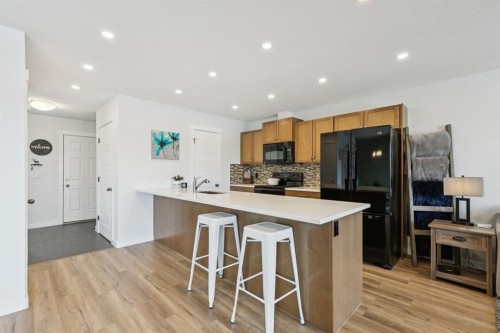 231 Kingsbridge Road Se, Airdrie, AB - Indoor Photo Showing Kitchen