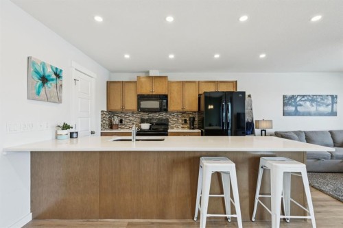 231 Kingsbridge Road Se, Airdrie, AB - Indoor Photo Showing Kitchen
