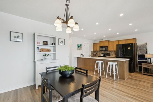 231 Kingsbridge Road Se, Airdrie, AB - Indoor Photo Showing Dining Room