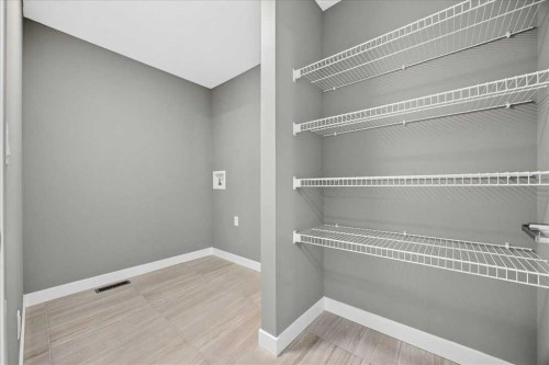156 Crimson Ridge Place Nw, Calgary, AB - Indoor With Storage