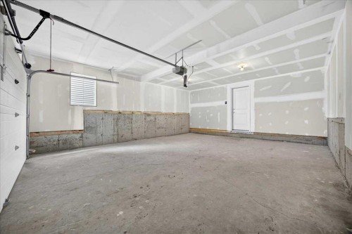 156 Crimson Ridge Place Nw, Calgary, AB - Indoor Photo Showing Garage