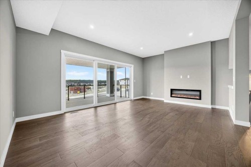 156 Crimson Ridge Place Nw, Calgary, AB - Indoor Photo Showing Living Room With Fireplace