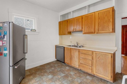 2003 26A Street Sw, Calgary, AB - Indoor Photo Showing Kitchen With Double Sink