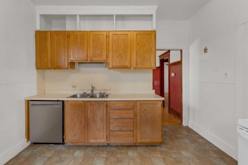 2003 26A Street Sw, Calgary, AB - Indoor Photo Showing Kitchen With Double Sink