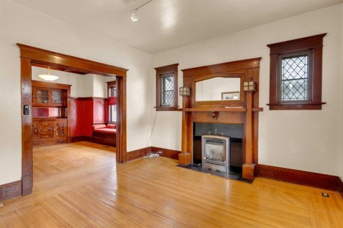 2003 26A Street Sw, Calgary, AB - Indoor Photo Showing Other Room With Fireplace