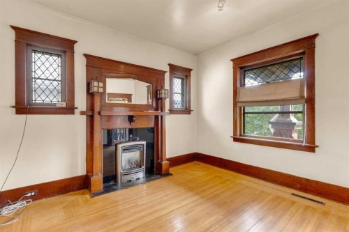 2003 26A Street Sw, Calgary, AB - Indoor Photo Showing Other Room With Fireplace