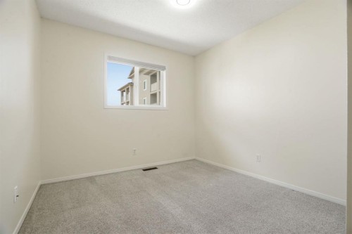 204-760 Railway Gate Sw, Airdrie, AB - Indoor Photo Showing Other Room