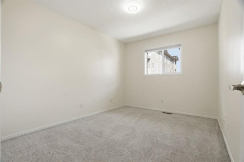 204-760 Railway Gate Sw, Airdrie, AB - Indoor Photo Showing Other Room