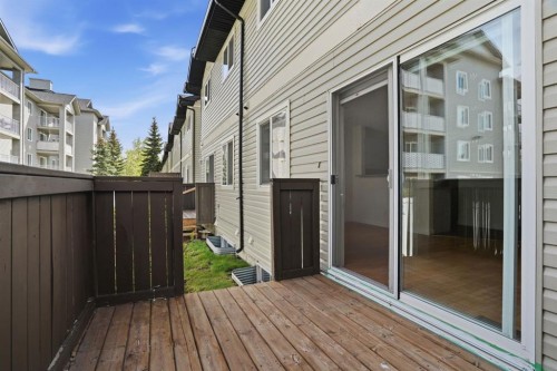 204-760 Railway Gate Sw, Airdrie, AB - Outdoor With Deck Patio Veranda With Exterior