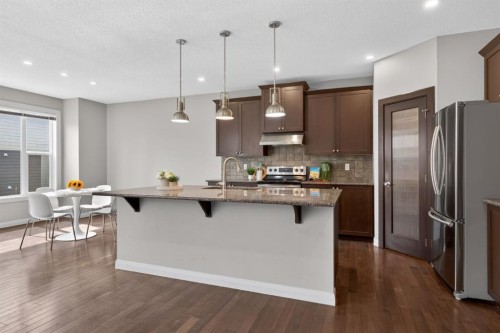 94 Evansdale Common Nw, Calgary, AB - Indoor Photo Showing Kitchen With Upgraded Kitchen