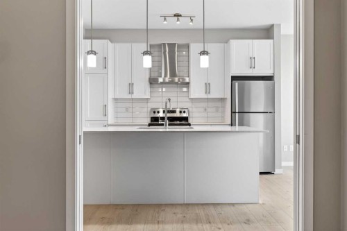 403-122 Mahogany Centre Se, Calgary, AB - Indoor Photo Showing Kitchen With Stainless Steel Kitchen With Upgraded Kitchen