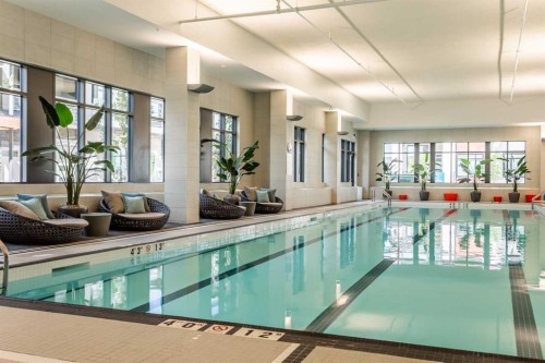 403-122 Mahogany Centre Se, Calgary, AB - Indoor Photo Showing Other Room With In Ground Pool