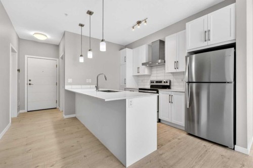 403-122 Mahogany Centre Se, Calgary, AB - Indoor Photo Showing Kitchen With Stainless Steel Kitchen With Upgraded Kitchen