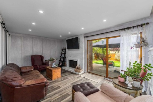 51 Midvalley Crescent Se, Calgary, AB - Indoor Photo Showing Living Room With Fireplace