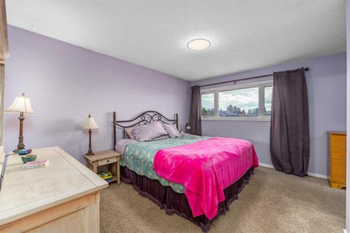 51 Midvalley Crescent Se, Calgary, AB - Indoor Photo Showing Bedroom