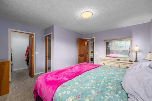51 Midvalley Crescent Se, Calgary, AB - Indoor Photo Showing Bedroom