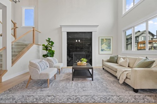 26 Cimarron Estates Gate, Okotoks, AB - Indoor With Fireplace