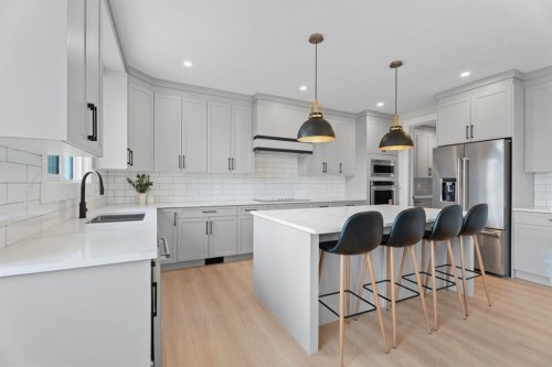 26 Cimarron Estates Gate, Okotoks, AB - Indoor Photo Showing Kitchen With Upgraded Kitchen