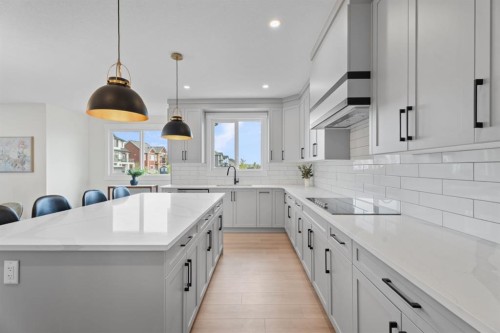 26 Cimarron Estates Gate, Okotoks, AB - Indoor Photo Showing Kitchen With Upgraded Kitchen