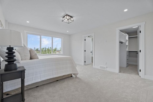 26 Cimarron Estates Gate, Okotoks, AB - Indoor Photo Showing Bedroom