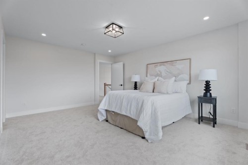 26 Cimarron Estates Gate, Okotoks, AB - Indoor Photo Showing Bedroom