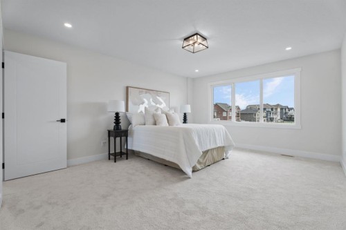 26 Cimarron Estates Gate, Okotoks, AB - Indoor Photo Showing Bedroom
