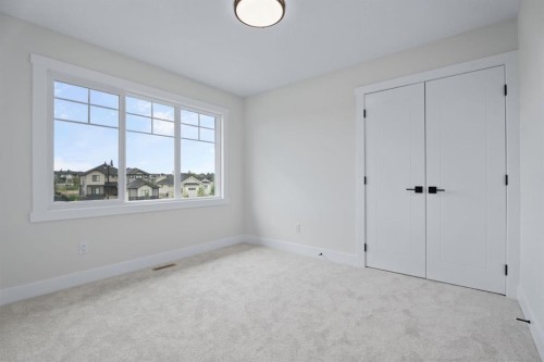 26 Cimarron Estates Gate, Okotoks, AB - Indoor Photo Showing Other Room