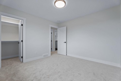 26 Cimarron Estates Gate, Okotoks, AB - Indoor Photo Showing Other Room