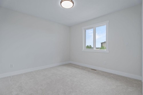 26 Cimarron Estates Gate, Okotoks, AB - Indoor Photo Showing Other Room