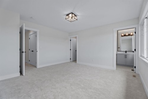 26 Cimarron Estates Gate, Okotoks, AB - Indoor Photo Showing Other Room