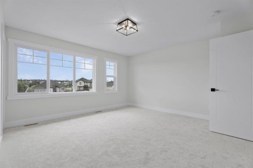 26 Cimarron Estates Gate, Okotoks, AB - Indoor Photo Showing Other Room