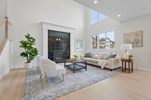 26 Cimarron Estates Gate, Okotoks, AB - Indoor Photo Showing Living Room With Fireplace