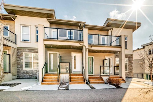123 Spring Creek Common Sw, Calgary, AB - Outdoor With Balcony With Facade