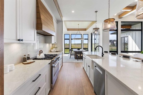 8 Monterra Rise, Cochrane Lake, AB - Indoor Photo Showing Kitchen With Upgraded Kitchen