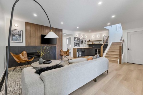 8 Monterra Rise, Cochrane Lake, AB - Indoor Photo Showing Living Room
