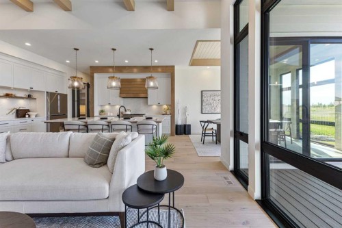 8 Monterra Rise, Cochrane Lake, AB - Indoor Photo Showing Living Room