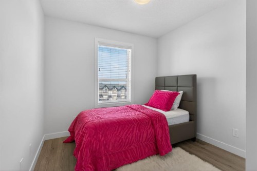 86 Evanscrest Manor Nw, Calgary, AB - Indoor Photo Showing Bedroom