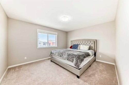 140 Howse Avenue Ne, Calgary, AB - Indoor Photo Showing Bedroom