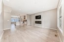 140 Howse Avenue Ne, Calgary, AB  - Indoor With Fireplace 