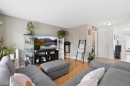 59 Taravista Street Ne, Calgary, AB  - Indoor Photo Showing Living Room 